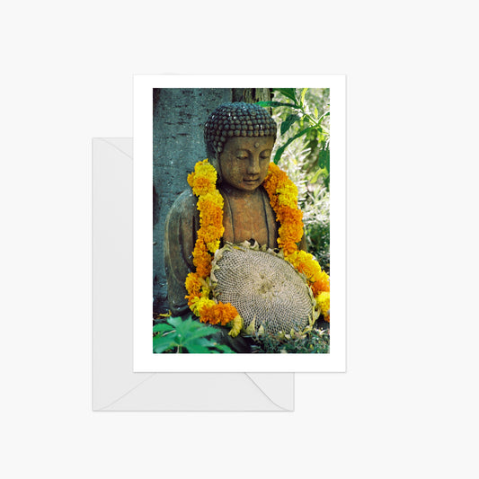 Buddha with Sunflower and Marigolds