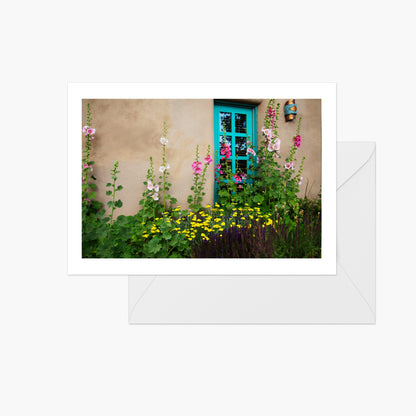 Turquoise Door with Spring Flowers